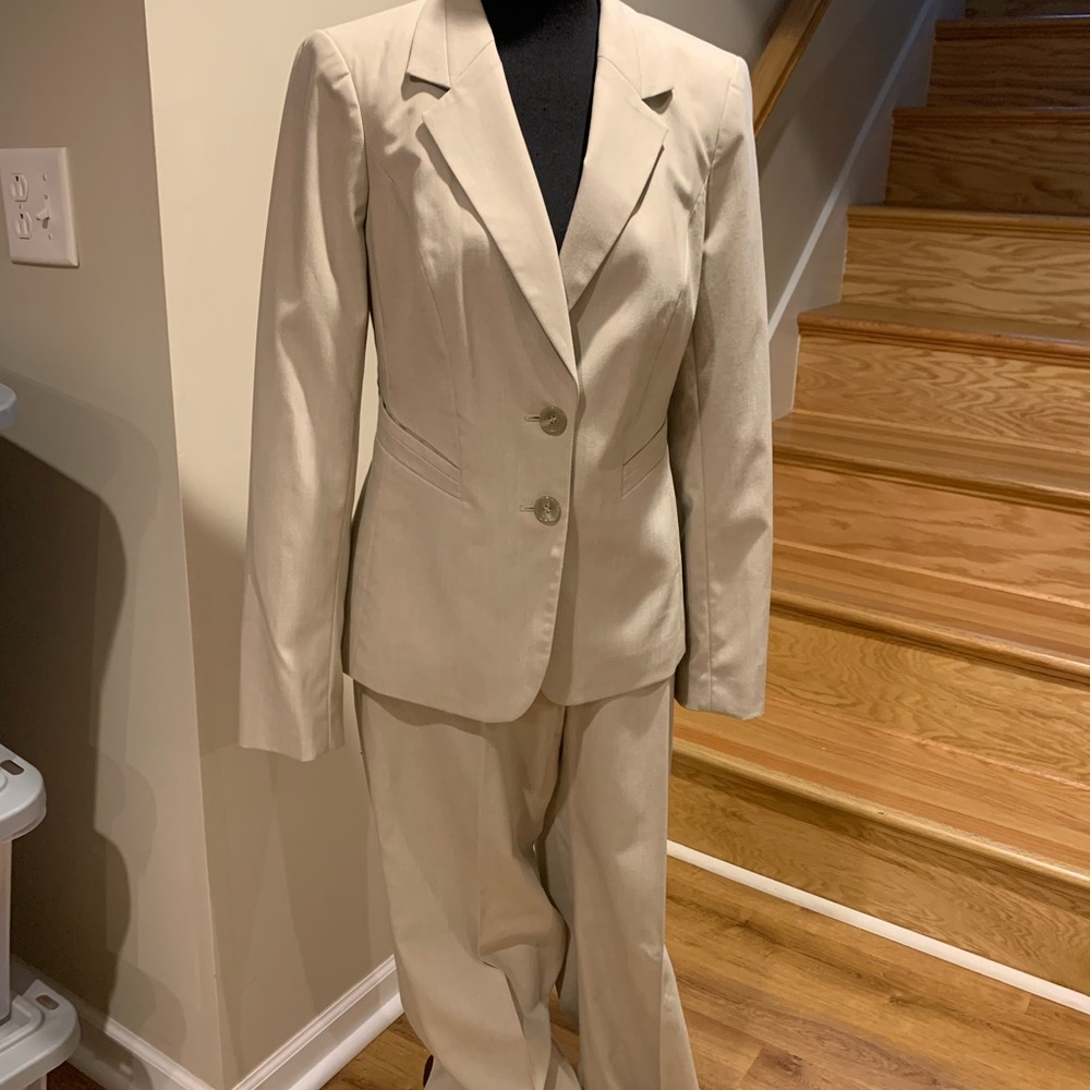 Limited collection beige suit.